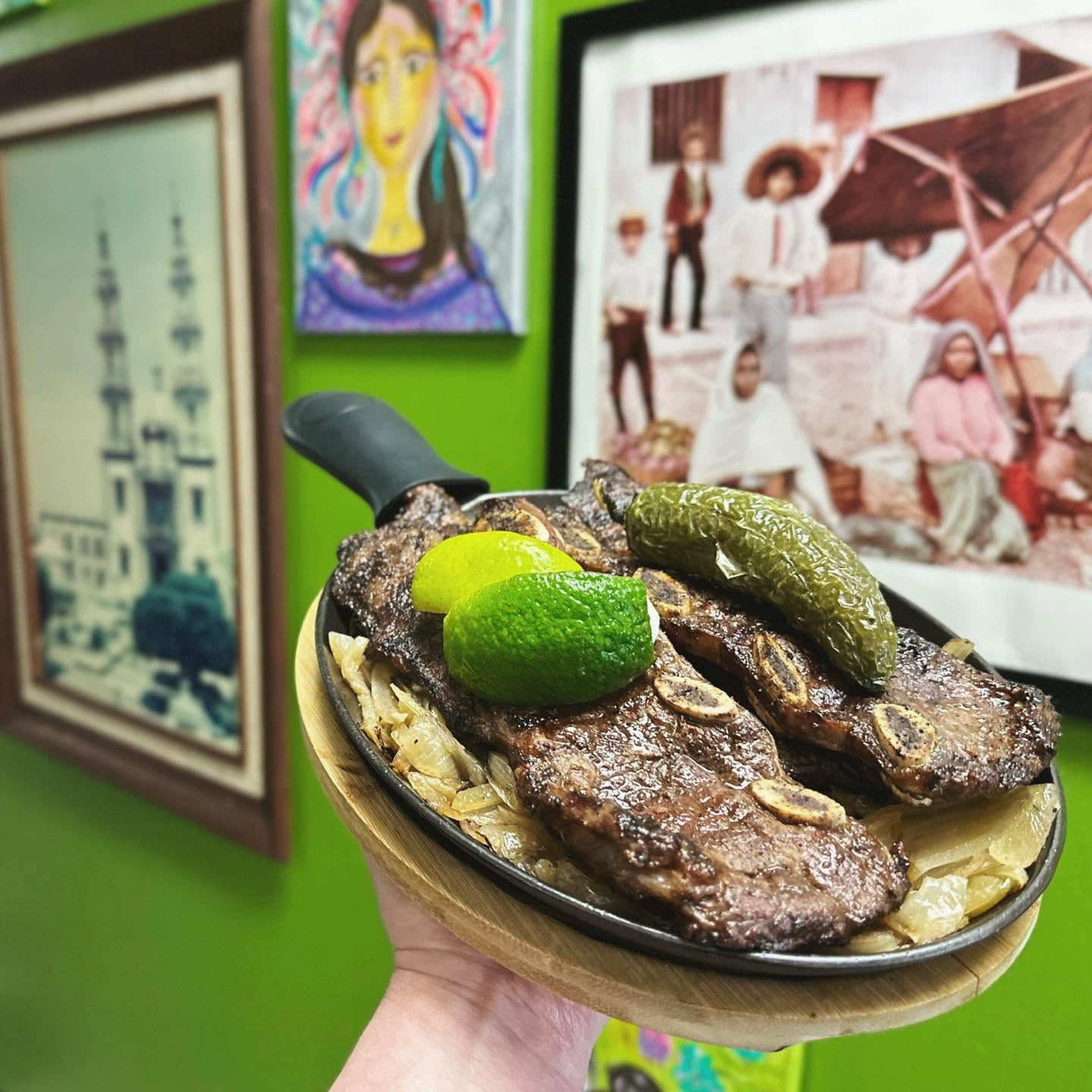 Sizzling carne asada at Cilantro